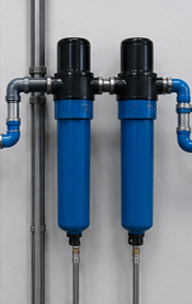 sistemas_de_filtracion Sistema de filtración para aire comprimido industrial que elimina partículas, aceite y humedad para garantizar aire limpio en la producción.